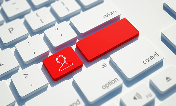 Office team using VoIP desk phones and headsets around shared conference table